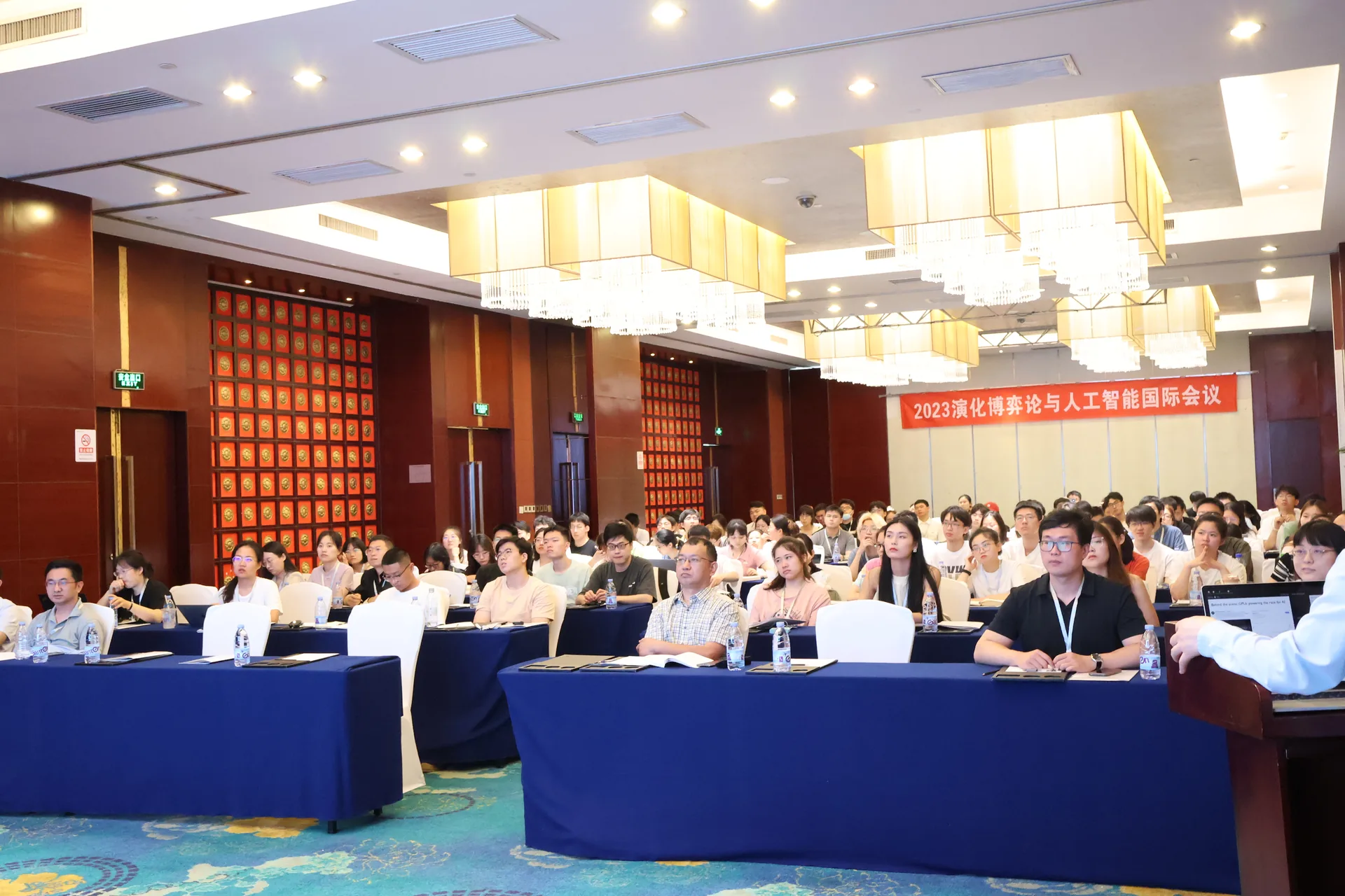 Participants attending an indoor session at EGAI 2023